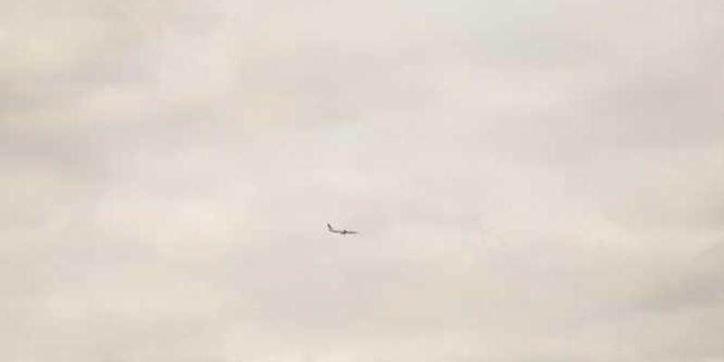 一把钥匙的背影，渐行渐远，消失在人群中